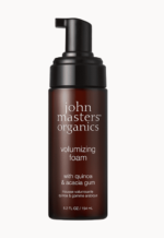 en flaske john masters organiske volumengivende skum.