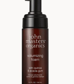 en flaske john masters organiske volumengivende skum.