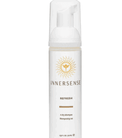 en flaske innersense deodorant på hvid baggrund.