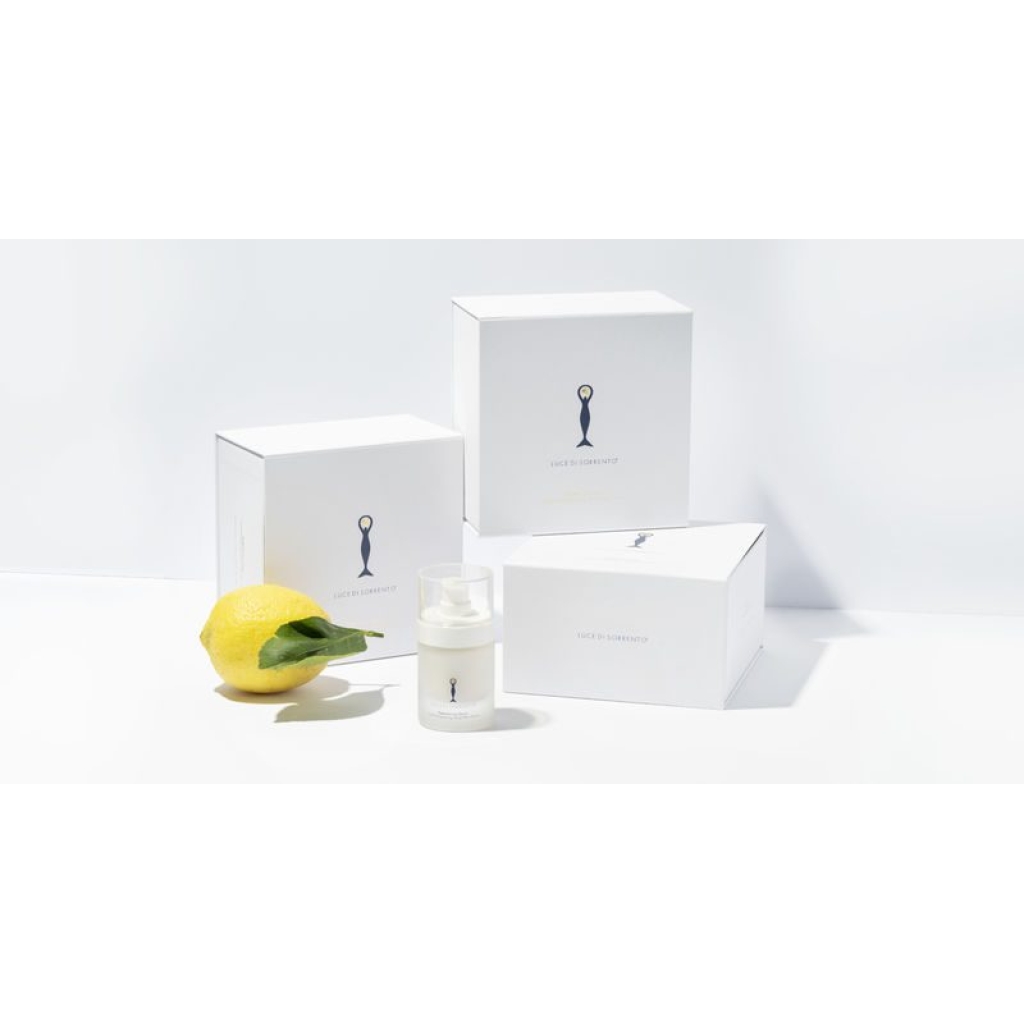 en citron, en flaske lotion og en kasse lotion.