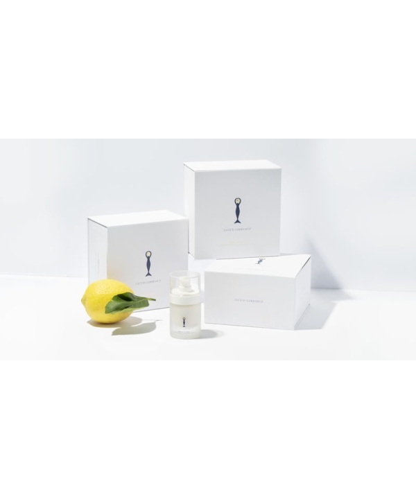 en citron, en flaske lotion og en kasse lotion.
