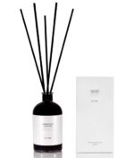 en flaske Laboratorio Olfattivo Di- Vino Diffuser 1000 ml ved siden af en æske.