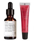 To hudplejeprodukter: en flaske Evolve Miracle face & Lip oil Duo og en tube Evolve læbebehandling med beskrivende etiketter.
