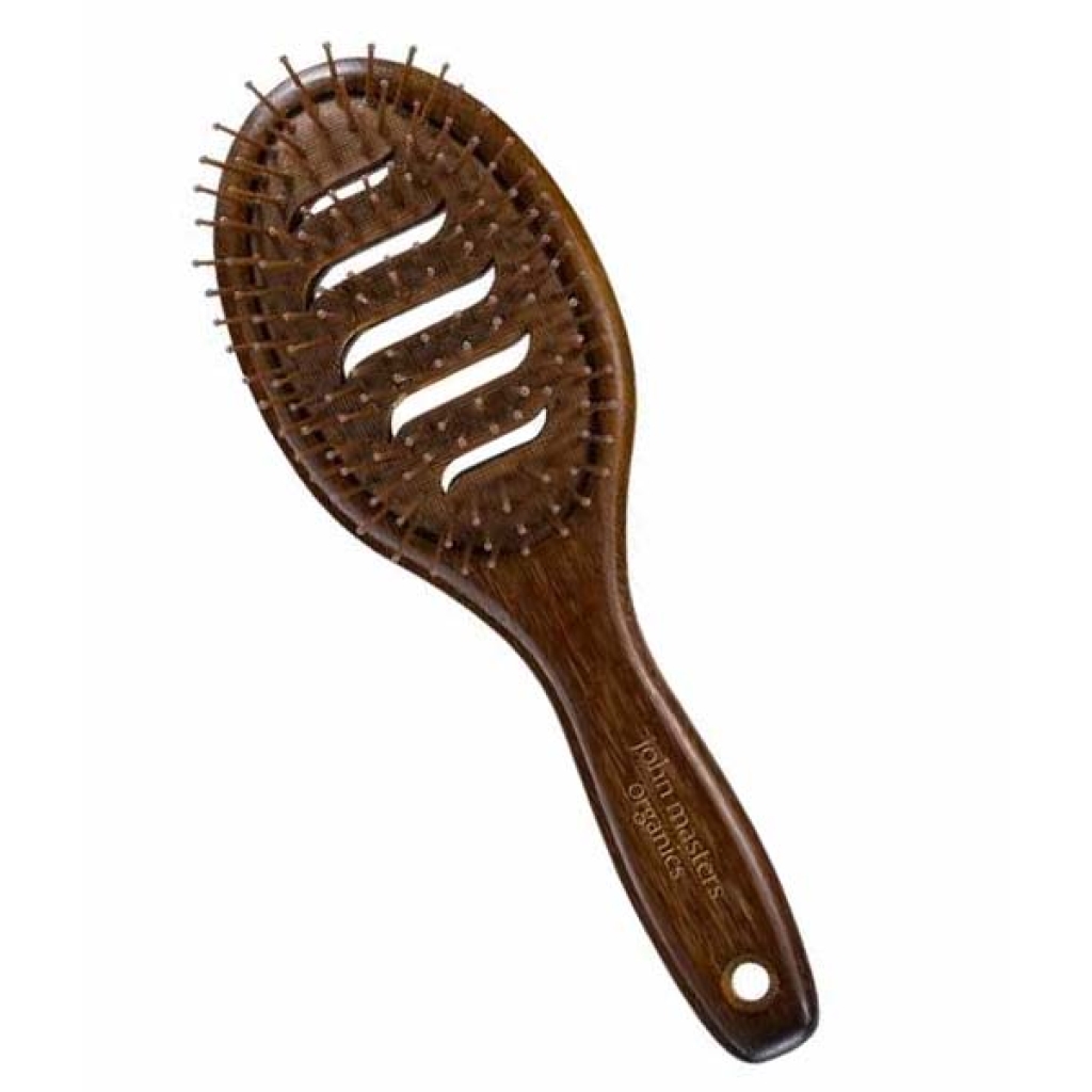 En John Masters Organics Vented Paddle Brush.
