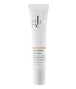 Et hvidt rør mærket "Glo Skin Beauty Hydra-Bright Eye Cream," med vitamin C og mælkesyre, i en 15 ml (0,5 fl oz) størrelse, er en del af Glo Skin Beauty Revitalize Eye Care Duo 2 x 15 ml.