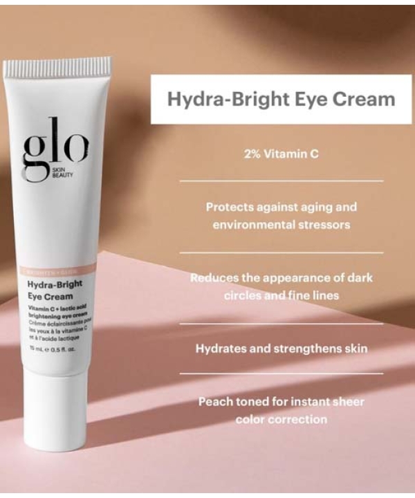 En tube Glo Skin Beauty Hydra-Bright Eye Cream fremvises sammen med en liste over fordele såsom vitamin C, anti-aging beskyttelse, reduktion af mørke rande og fine linjer, hydrering og ren farvekorrektion. Perfekt til at parre med Glo Skin Beauty Revitalize Eye Care Duo 2 x 15 ml for forbedrede resultater.